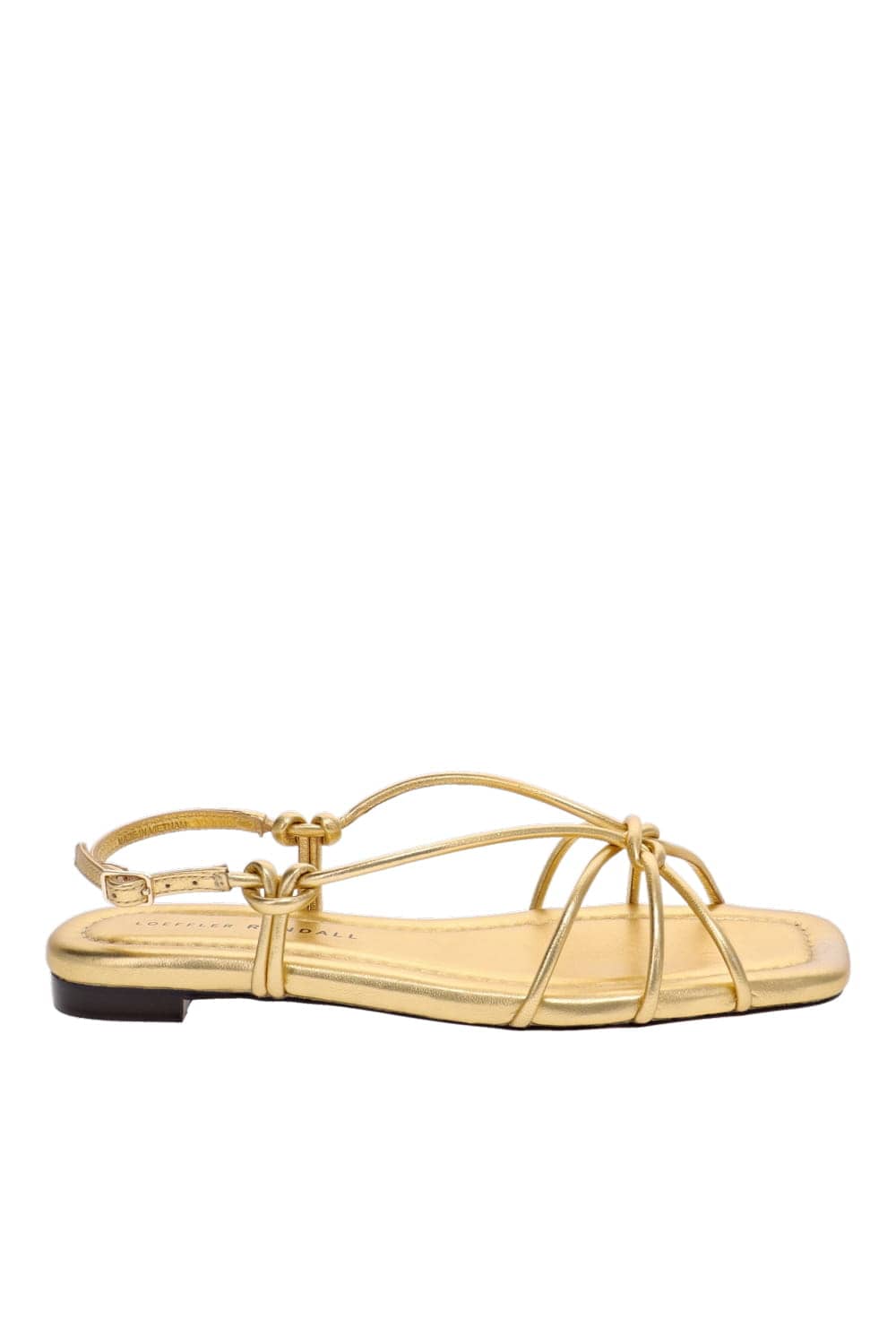 The Golden Hour Flat: Why Strappy Sandals Are the Season's Smartest Investment